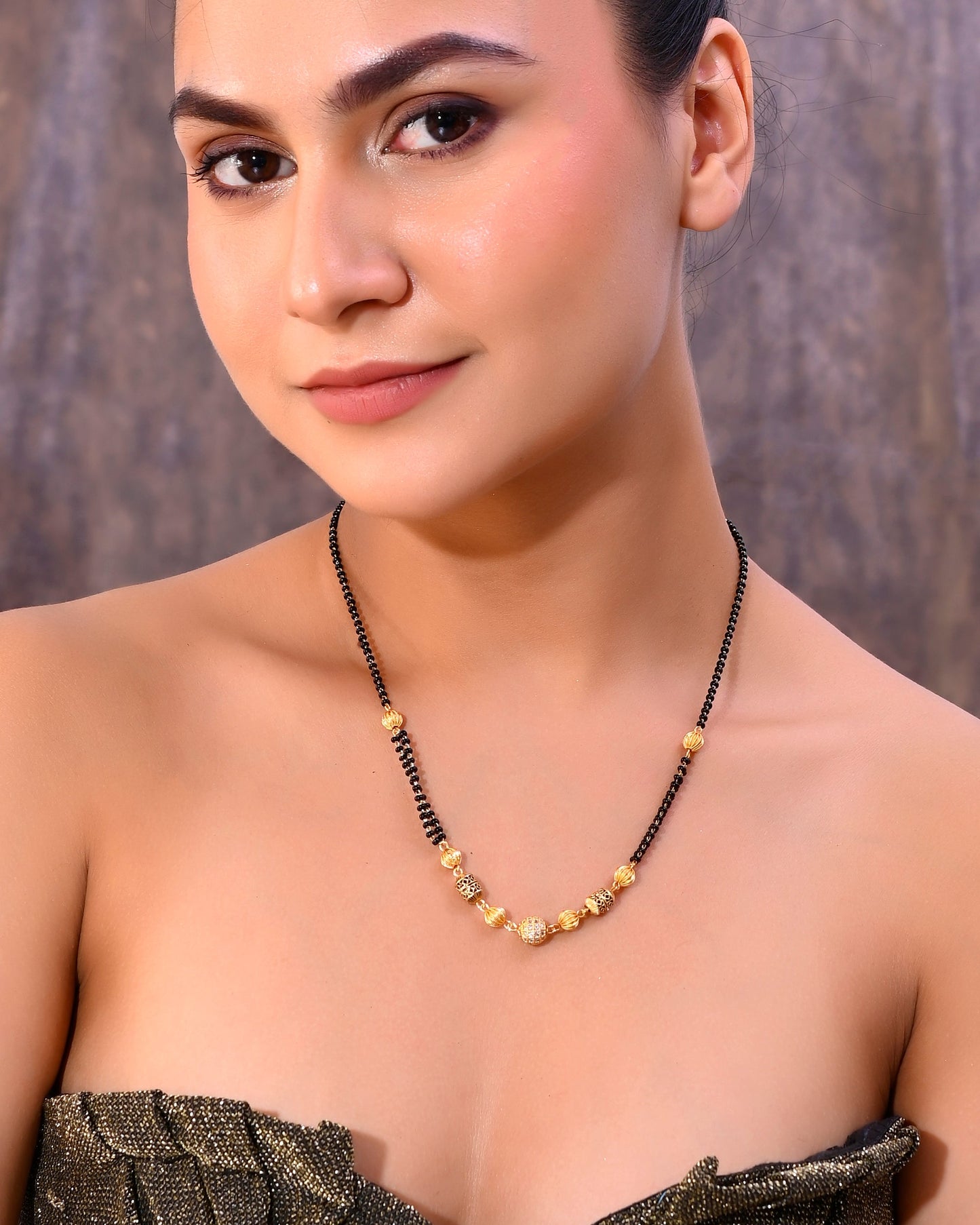 VOJ Gold-Polished Stone Studded Cricular shaped Mangalsutra