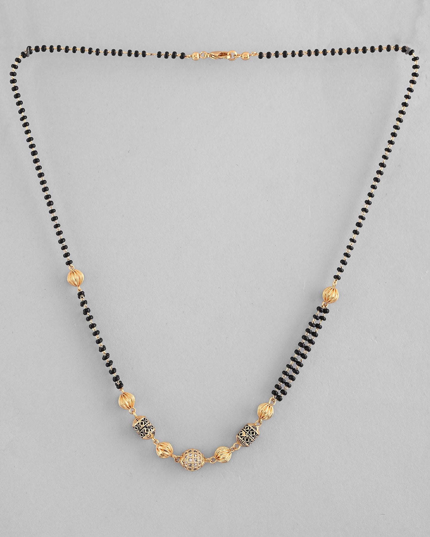 VOJ Gold-Polished Stone Studded Cricular shaped Mangalsutra