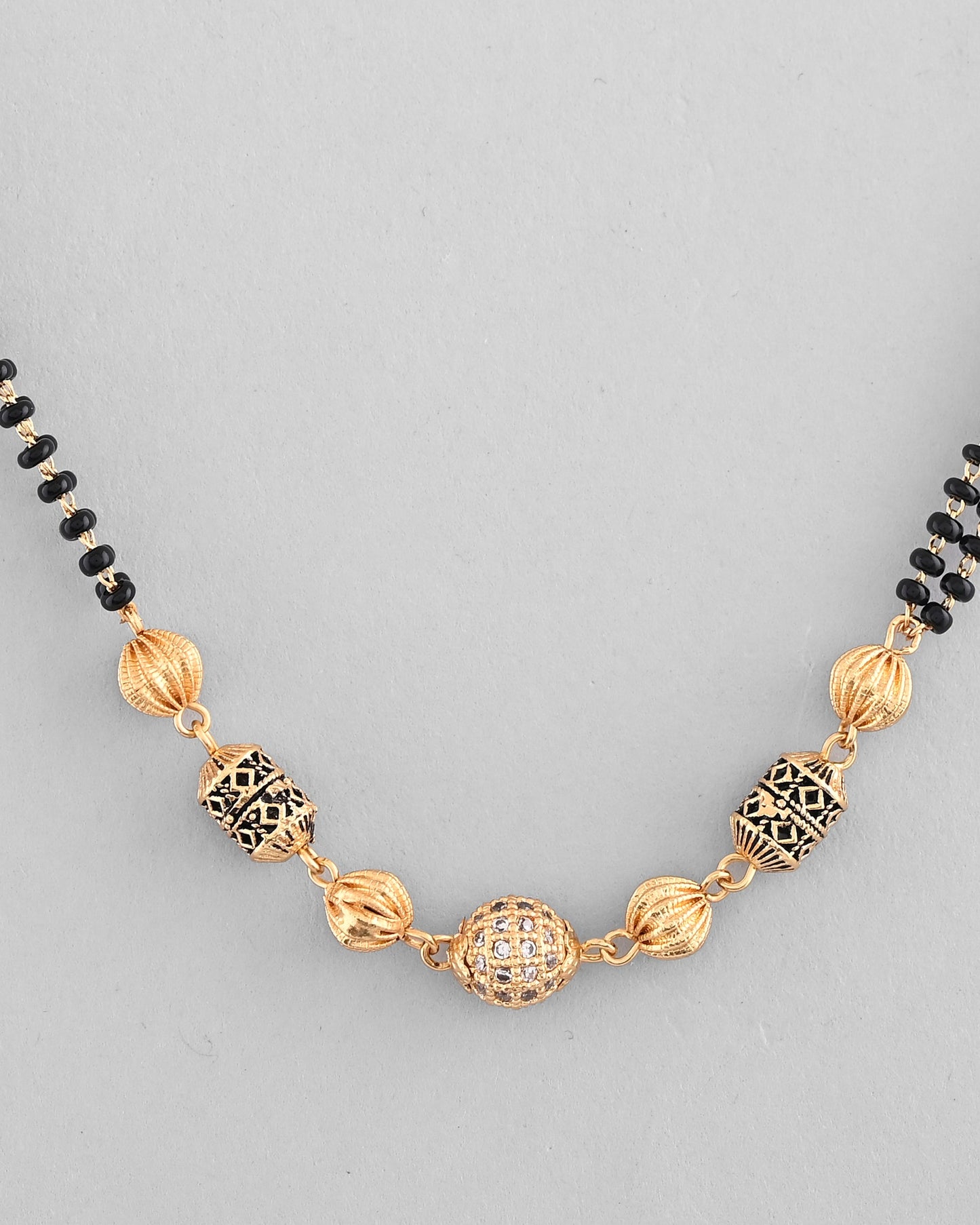VOJ Gold-Polished Stone Studded Cricular shaped Mangalsutra