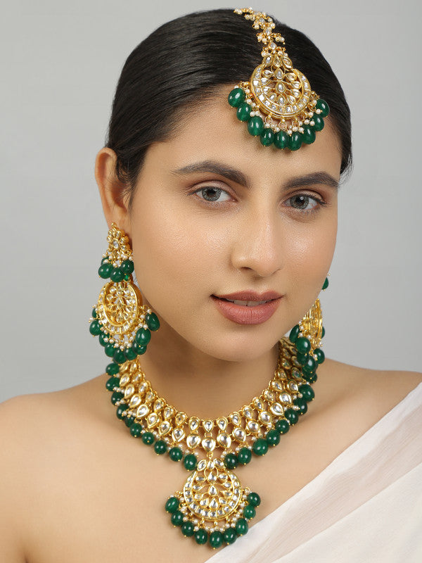 Beautiful Dark Green and Golden Kundan Necklace with Earrings and Maang Tikka