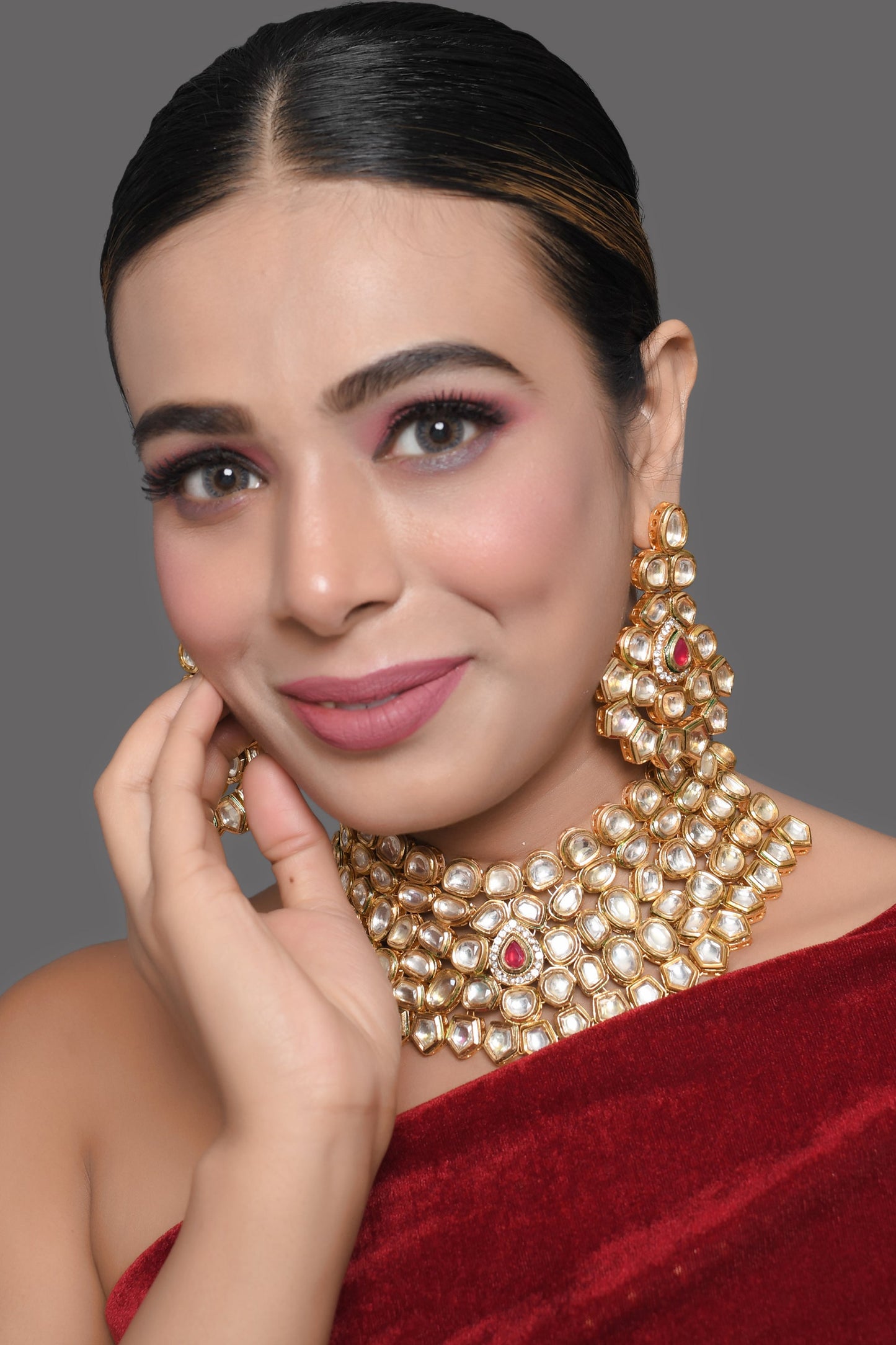 Designer Gold Toned Kundan Necklace with Earrings